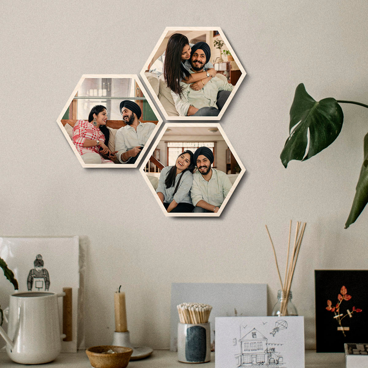 Wood picture wall art – set of 3 birch hexagon photo tiles printed with couple photographs, arranged as a personalized wall display