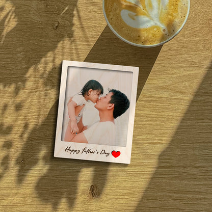 Dad fridge magnet on a clean backdrop showing polaroid with 'Happy Father's Day' cursive, with magnet back and 3x4 inch.