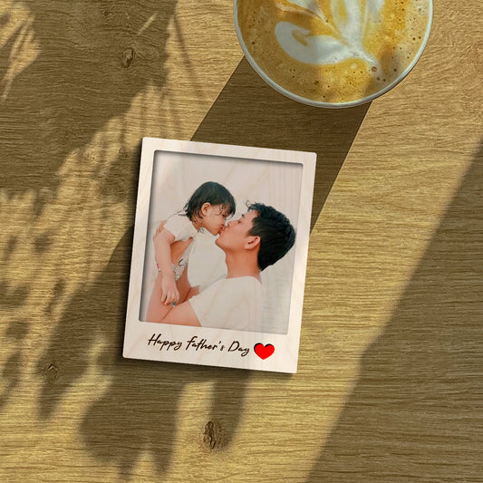 Dad fridge magnet on a clean backdrop showing polaroid with 'Happy Father's Day' cursive, with magnet back and 3x4 inch.