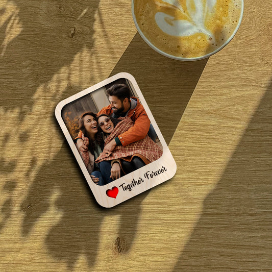 Couple fridge magnet on a clean backdrop showing polaroid with 'Together Forever' cursive, with magnet back and 4x3 inch.