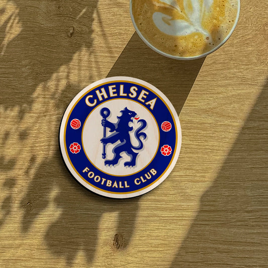 Chelsea fridge magnet on a clean backdrop showing chelsea blue rampant lion roundel with gold ring text.