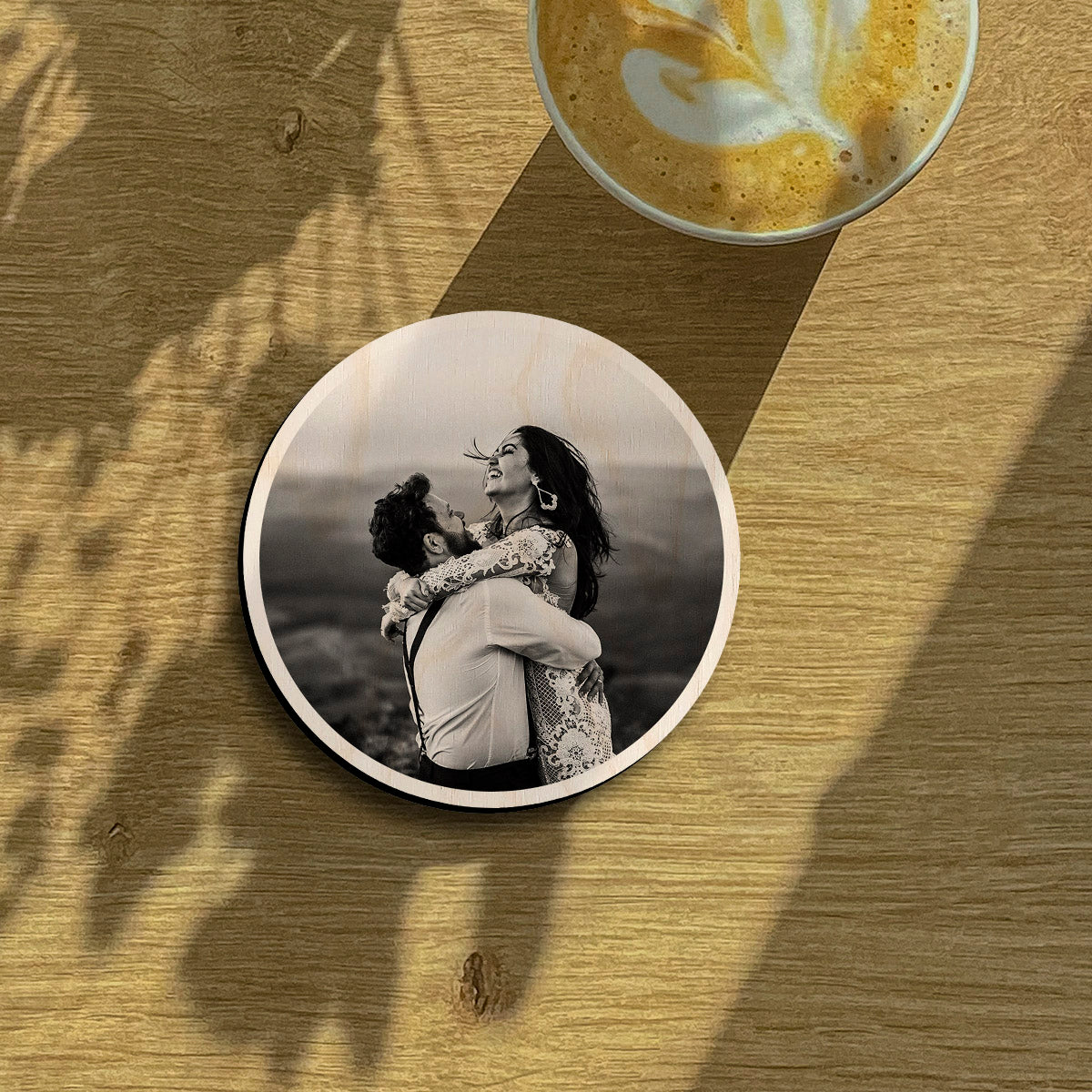 Couple fridge magnet on a clean backdrop showing circle contour-cut silhouette with full-bleed couple photo.