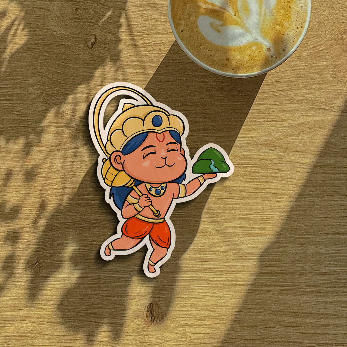 God fridge magnet on a clean backdrop showing cartoon Hanuman with Sanjivani mountain and golden crown.