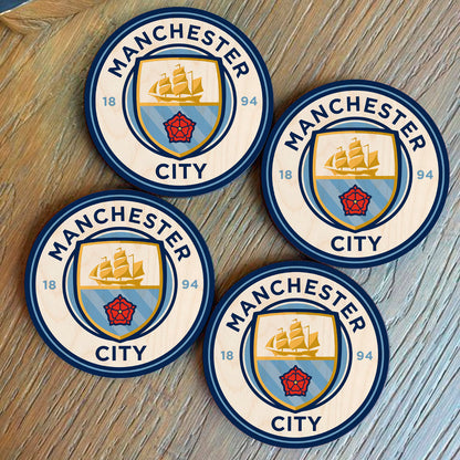 Manchester City wooden coaster – round birch wood coaster printed with the Manchester City club crest in sky blue, 4x4 inches