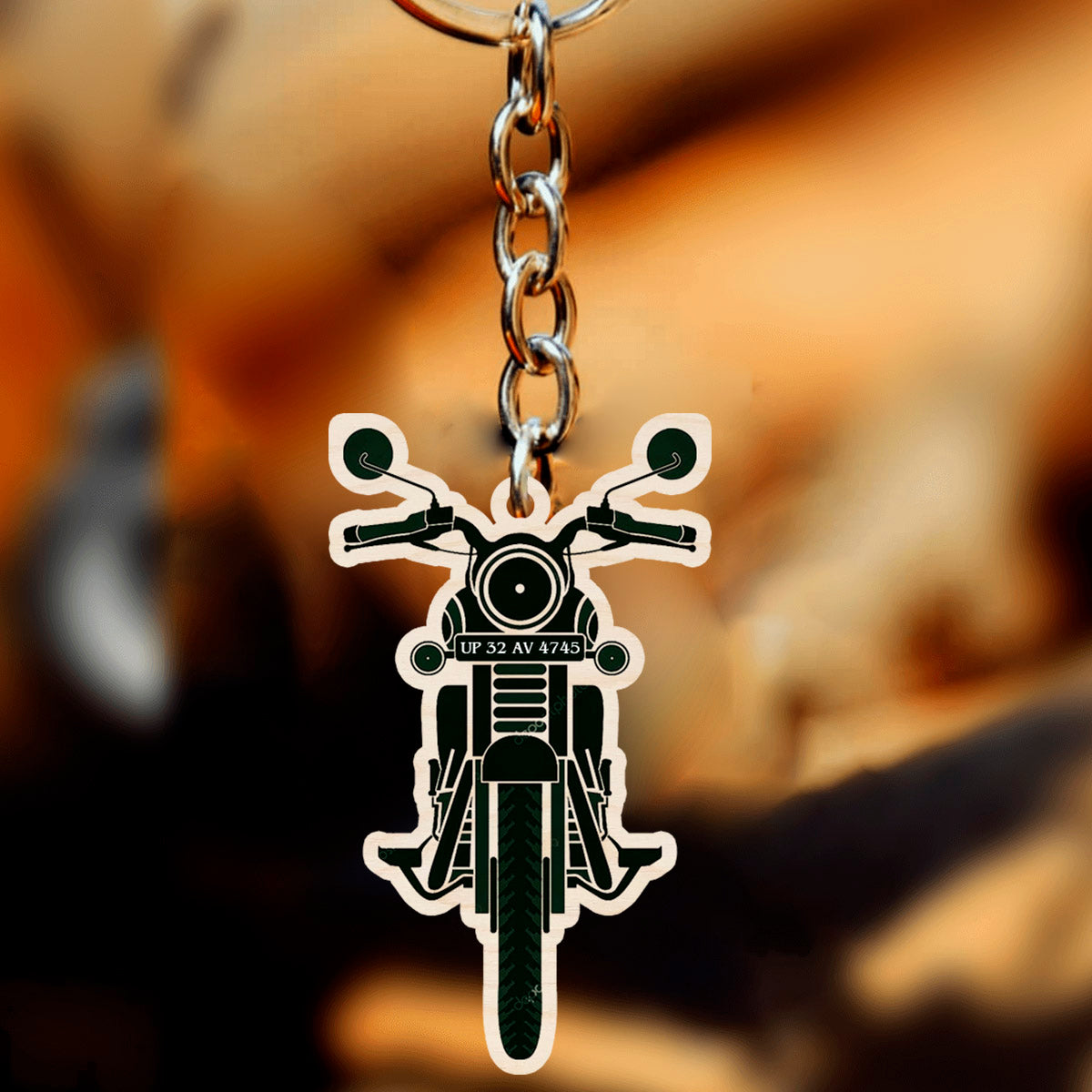 Bike keychain royal enfield on a clean backdrop showing bullet silhouette cutout with real custom number-plate slot.