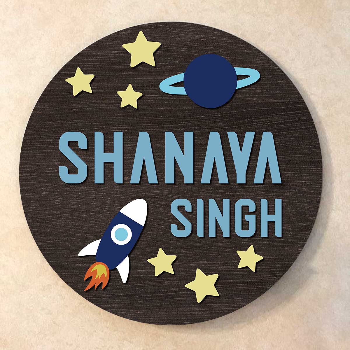 Space theme kids name plate with a child's name in blue 3D letters, rocket and planet