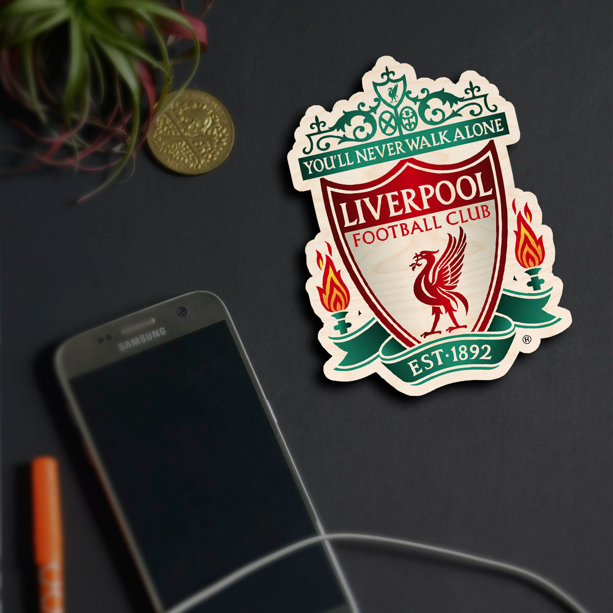 Alternate angle on the liverpool fridge magnet, showing full ornate Liverpool crest with YNWA, in birch wood.