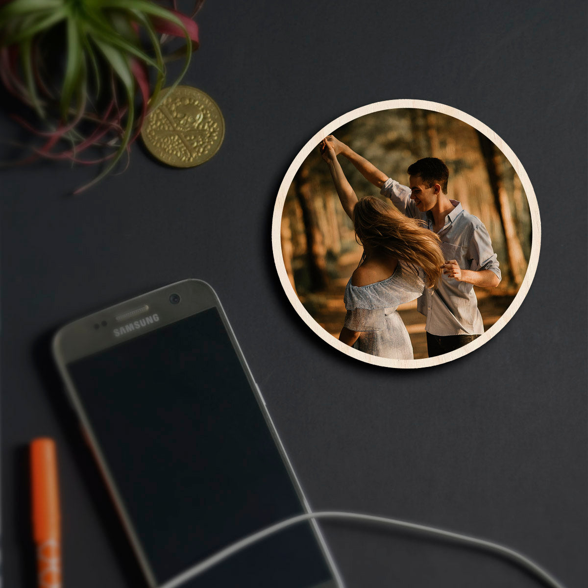 Alternate angle on the couple fridge magnet, showing circle contour-cut silhouette with full-bleed couple photo.