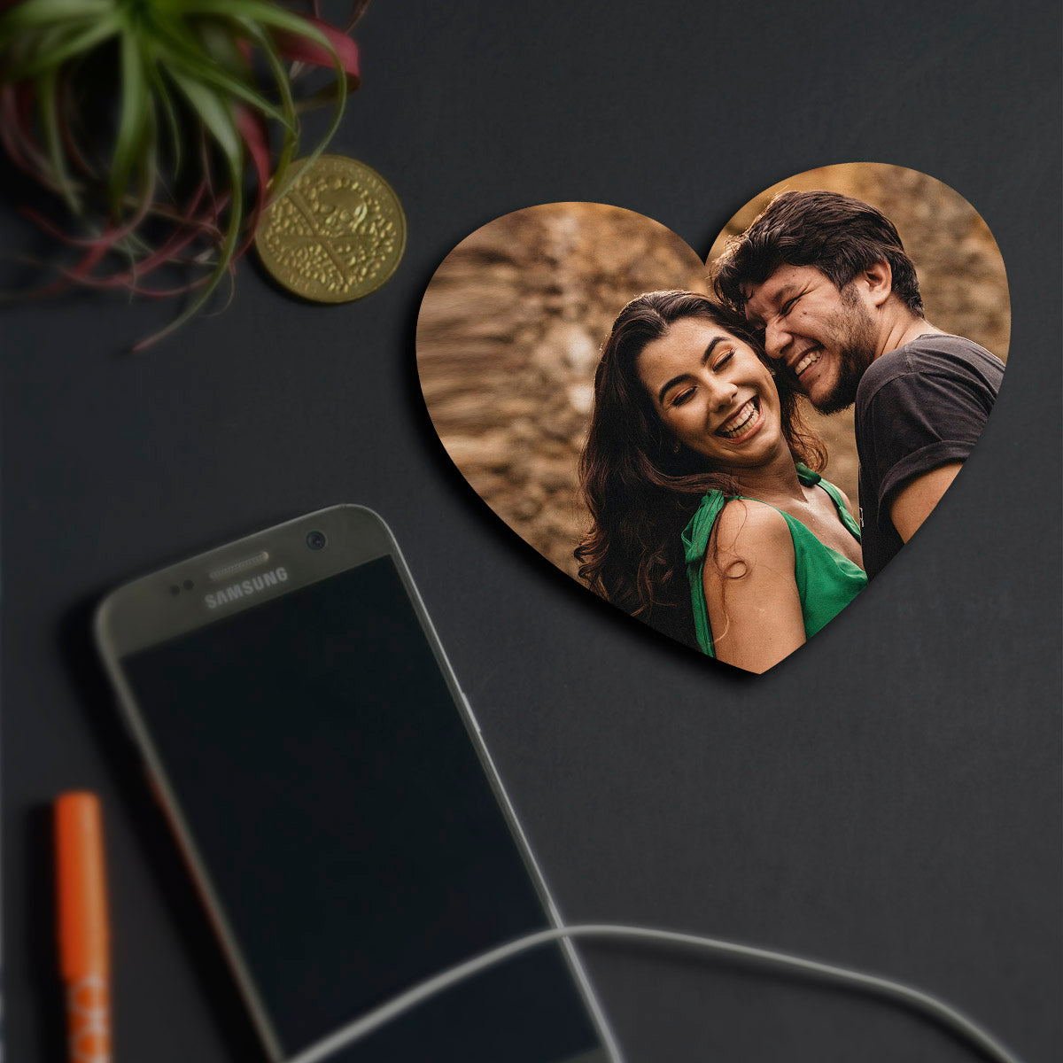 Alternate angle on the couple fridge magnet, showing heart contour-cut silhouette with full-bleed couple photo.
