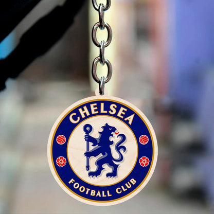 Alternate angle on the football keychain, showing chelsea blue rampant lion roundel with gold ring text.
