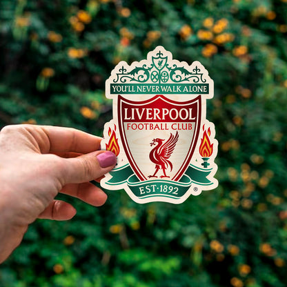 Detail crop of the liverpool fridge magnet, with full ornate Liverpool crest with YNWA, on birch wood face.