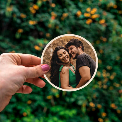 Detail crop of the couple fridge magnet, with circle contour-cut silhouette with full-bleed couple photo.