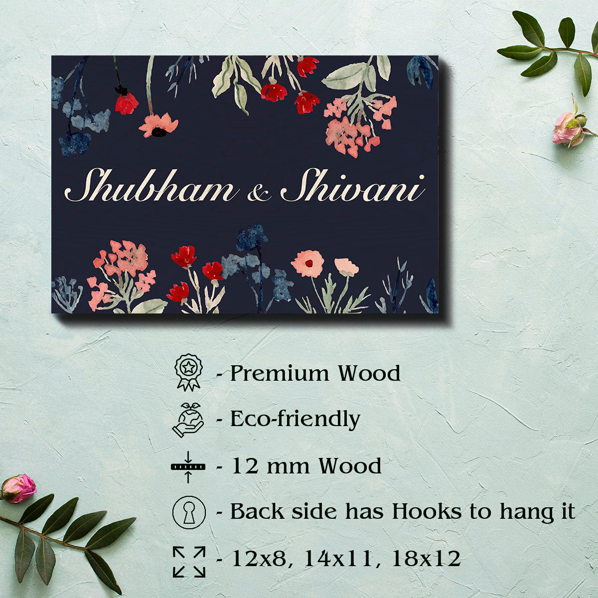 Personalised dark floral couple name plate with couple names in white script on navy