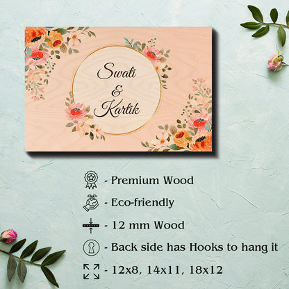 Personalised name board for flat with couple names inside gold ring on peach birch