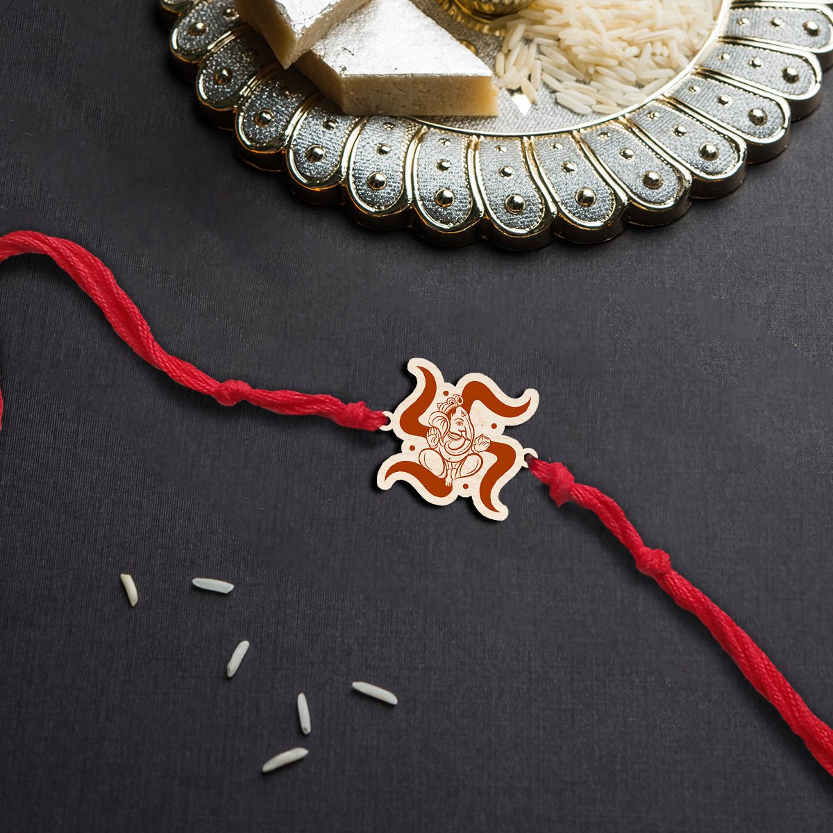 Ganesha Swastik Rakhi – Wooden Spiritual Brother Name - Sblossom