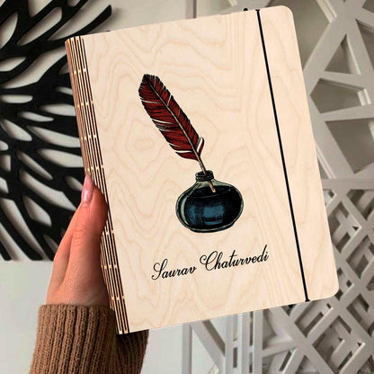 Alternate angle on the personalized diary, showing color-printed quill + navy inkwell illustration with, in birch wood.
