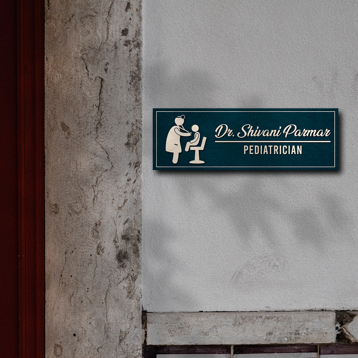 Pediatric icon doctor name plate on slim teal birch with white 3D acrylic and child-care icon