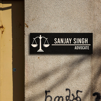 Advocate name plate for office with a scales-of-justice motif and name in bold caps