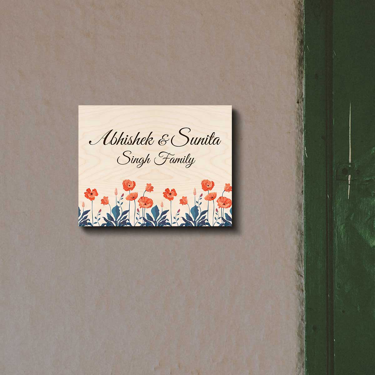 Poppy flower couple name plate with two names in cursive over orange poppies on birch