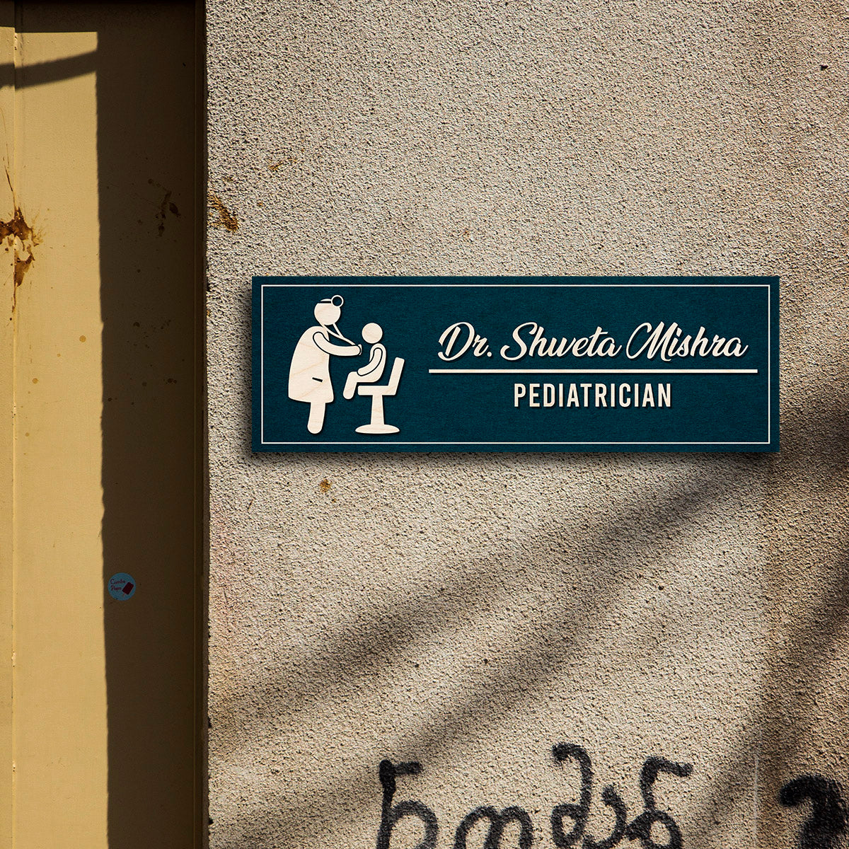 Slim teal doctor name plate with white acrylic pediatric icon and doctor name