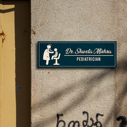 Slim teal doctor name plate with white acrylic pediatric icon and doctor name