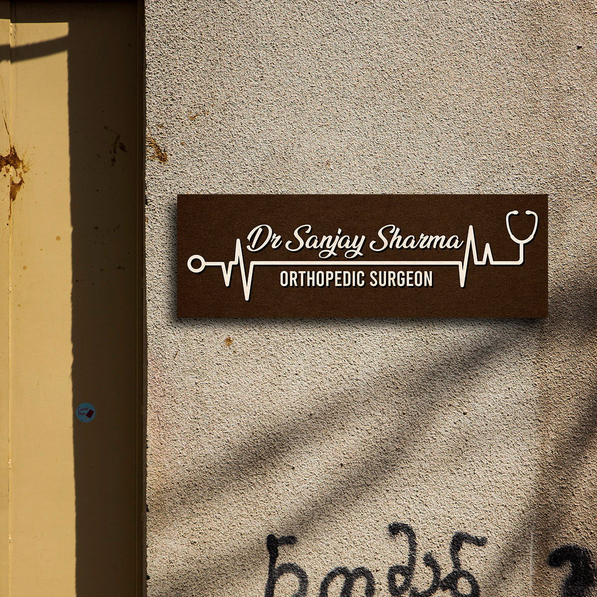 Heartbeat name plate with ECG line, stethoscope and doctor name in cream script