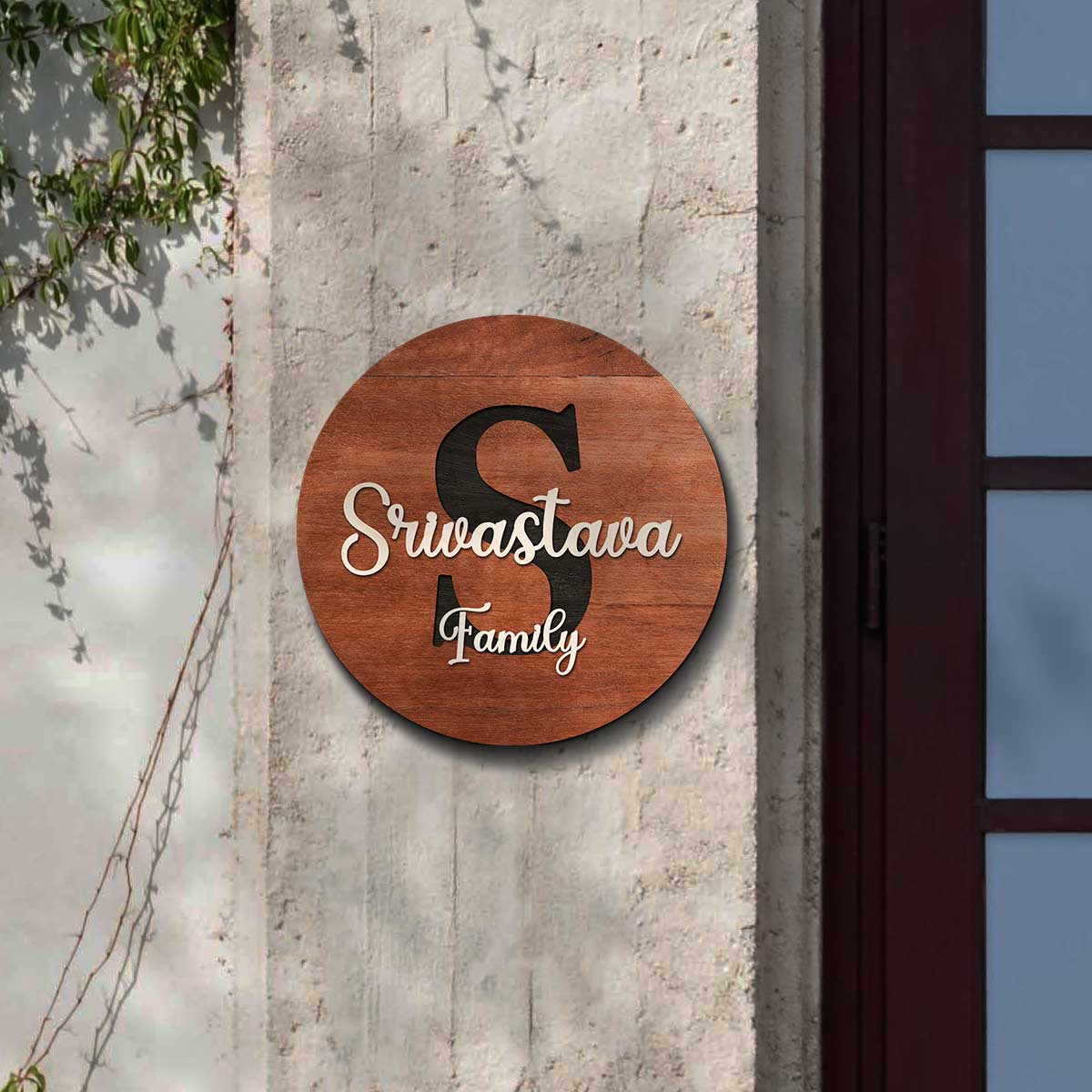 Large surname monogram and raised 3D wooden letters on round personalized name plate for home