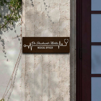 Slim heartbeat name plate design styled on clinic door with wooden 3D letters