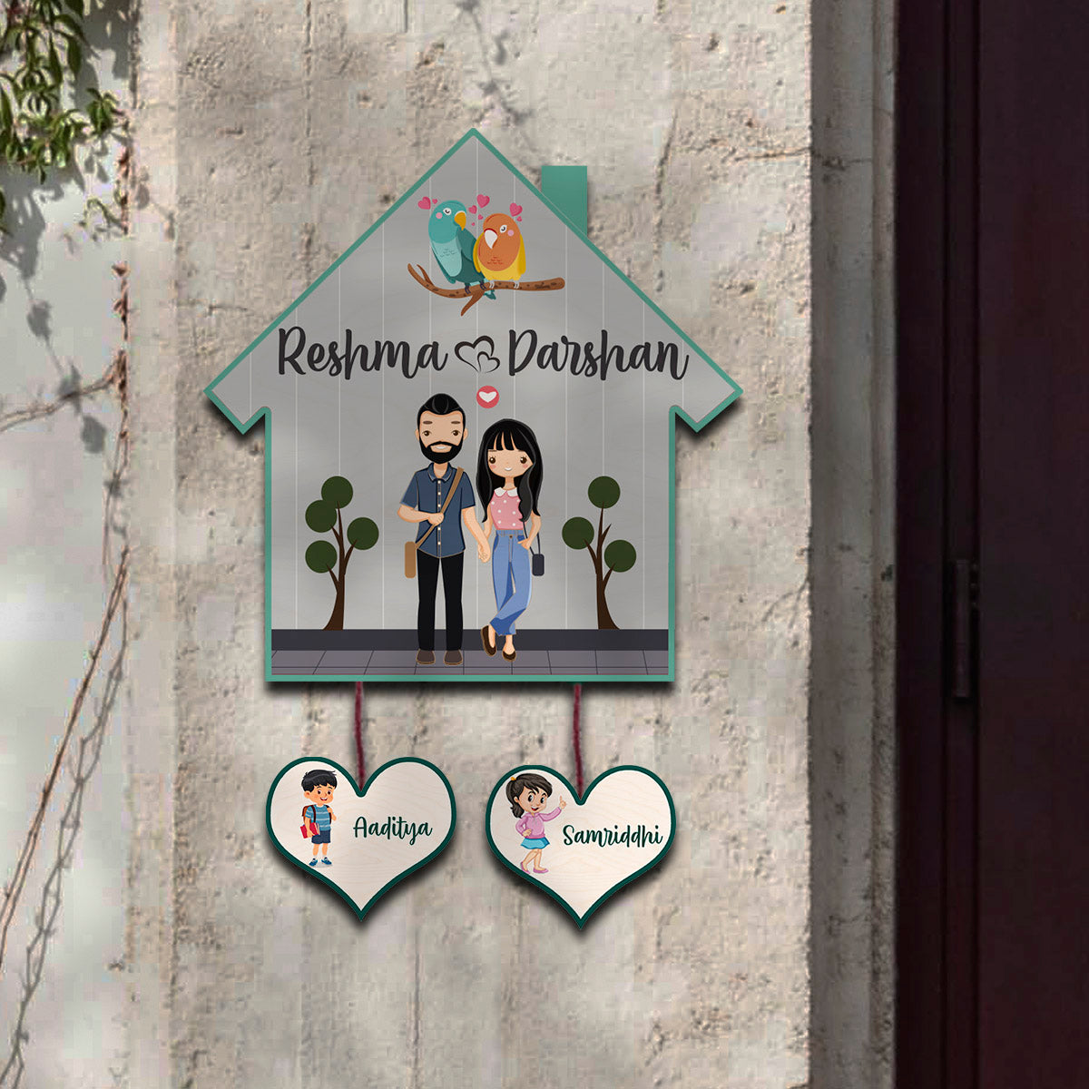 Full view of hut shape family name plate – illustrated family on birch