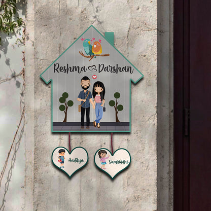 Full view of hut shape family name plate – illustrated family on birch