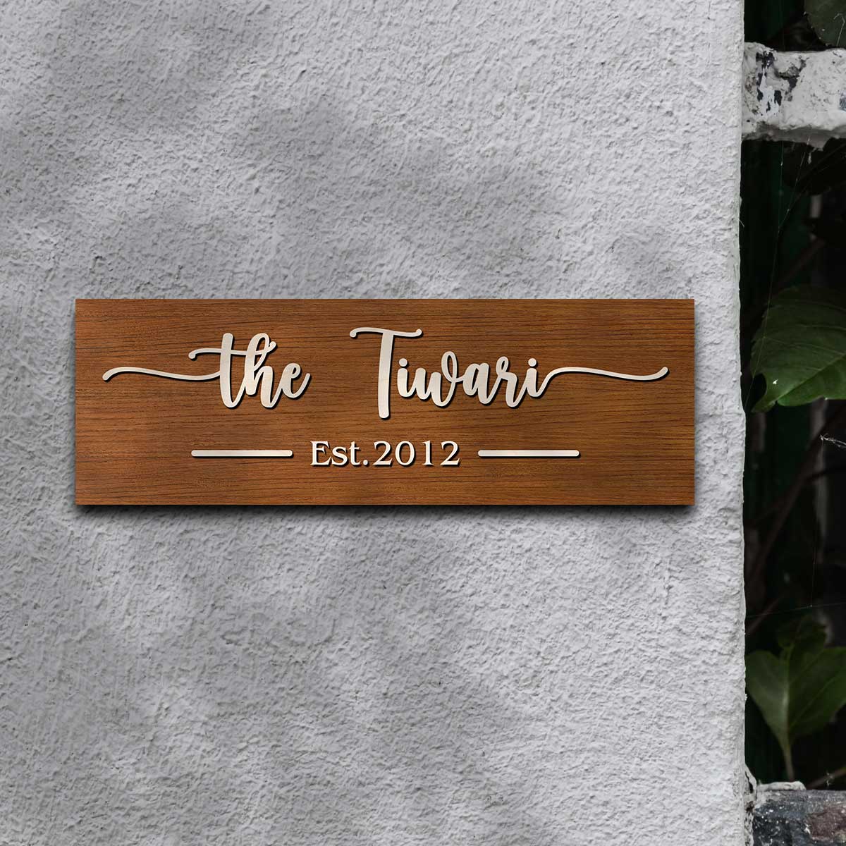 3D wooden name plate with raised cursive family surname and Est. year on brown 12x4 inch birch