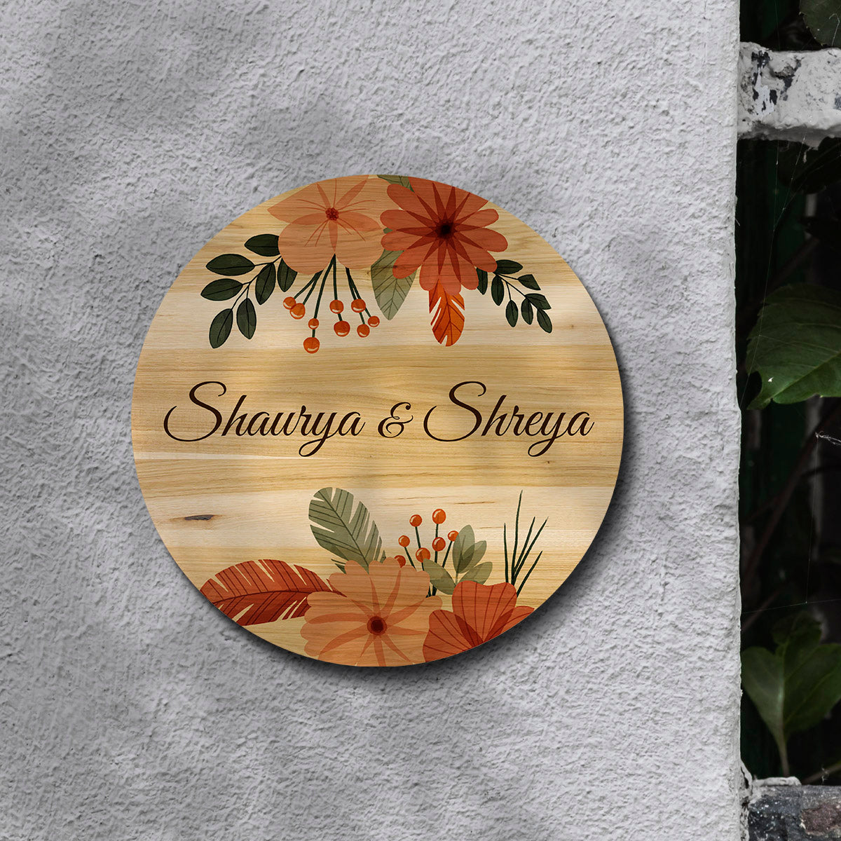 Personalised boho name plate design with family name and house number on natural birch wood
