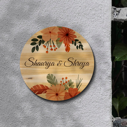 Personalised boho name plate design with family name and house number on natural birch wood