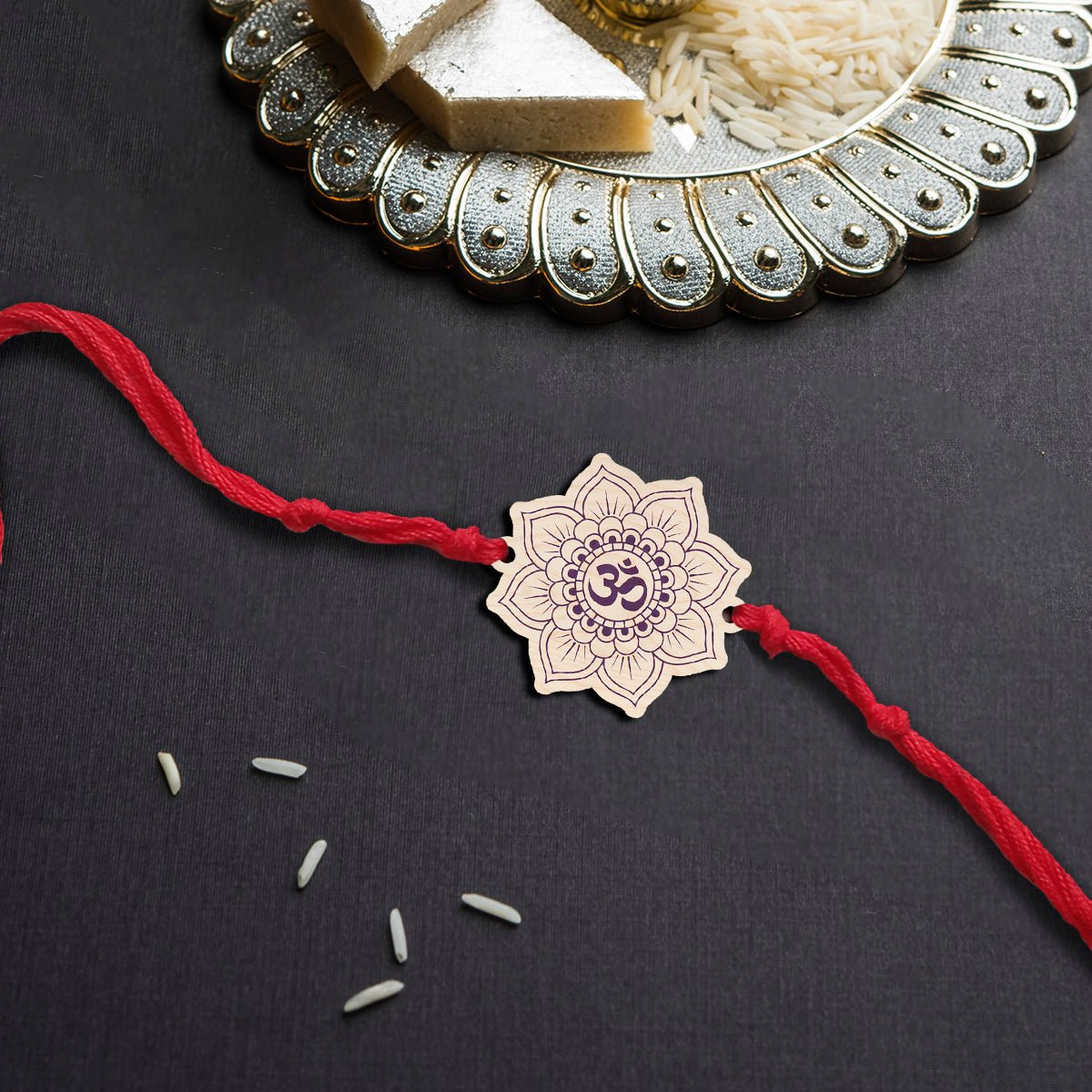 Om Rakhi for Brother in Wood with Spiritual Floral Design - Sblossom